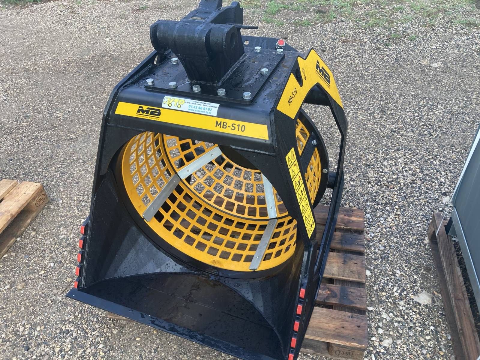 Godet cribleur rotatif