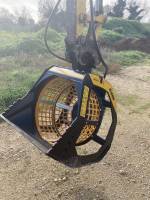 Godet cribleur rotatif