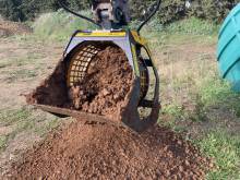 Godet cribleur rotatif